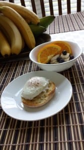 Our breakfast, poached egg on muffin with fresh fruit.